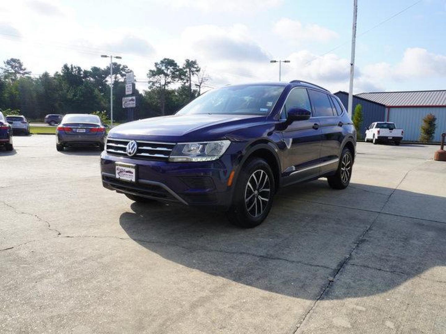 2021 Blue Volkswagen Tiguan (3VV3B7AX7MM) with an 2.0L 4Cyl engine, 8 Spd Automatic transmission, located at 6904 Johnston St., Lafayette, LA, 70503, (337) 988-1960, 30.143589, -92.100601 - Prices are subject to change as improvements done by the service dept. Prices are for Cash sales only, Plus TTL. This Vehicle is Serviced well and Warranties Available too. Easy Financing. Drives Great and everything works. Price subject to change as improvements done by the service dept. Easy CR - Photo#5