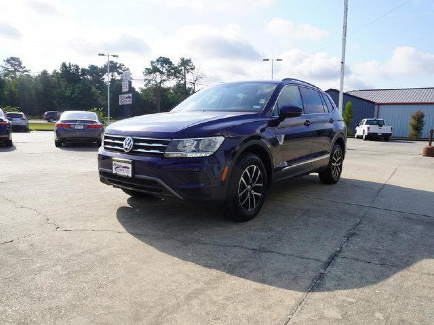 2021 Blue /Storm Gray Volkswagen Tiguan 2.0T SE FWD (3VV3B7AX7MM) with an 2.0L 4Cyl engine, 8 Spd Automatic transmission, located at 6904 Johnston St., Lafayette, LA, 70503, (337) 988-1960, 30.143589, -92.100601 - Photo#5