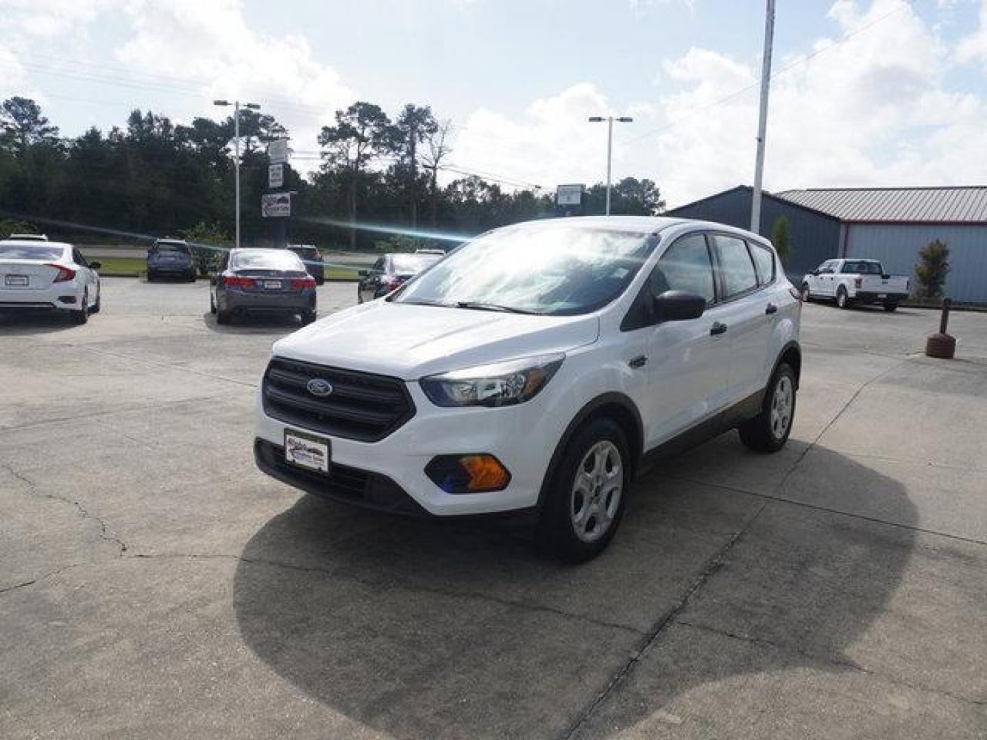 2019 White Ford Escape (1FMCU0F75KU) with an 2.5L 4Cyl engine, Automatic transmission, located at 6904 Johnston St., Lafayette, LA, 70503, (337) 988-1960, 30.143589, -92.100601 - Prices are subject to change as improvements done by the service dept. Prices are for Cash sales only, Plus TTL. This Vehicle is Serviced well and Warranties Available too. Easy Financing. Drives Great and everything works. Price subject to change as improvements done by the service dept. Easy CR - Photo#5