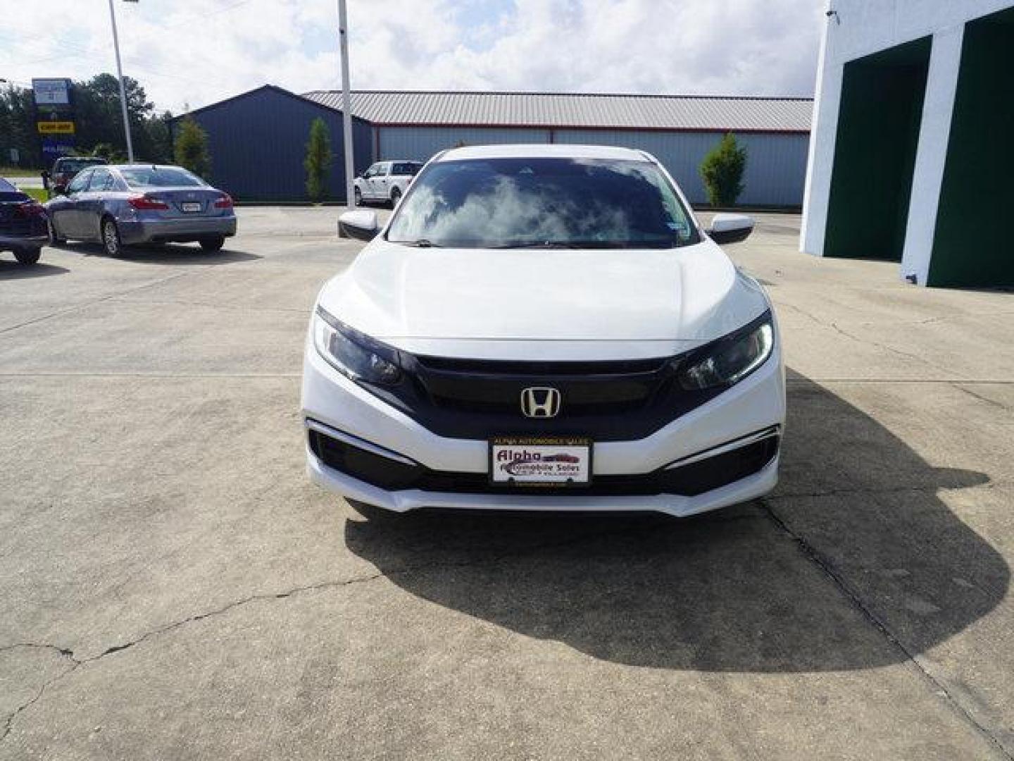 2020 White Honda Civic (19XFC2F67LE) with an 2.0L 4Cyl engine, Automatic CVT transmission, located at 6904 Johnston St., Lafayette, LA, 70503, (337) 988-1960, 30.143589, -92.100601 - Prices are subject to change as improvements done by the service dept. Prices are for Cash sales only, Plus TTL. This Vehicle is Serviced well and Warranties Available too. Easy Financing. Drives Great and everything works. Price subject to change as improvements done by the service dept. Easy CR - Photo#3