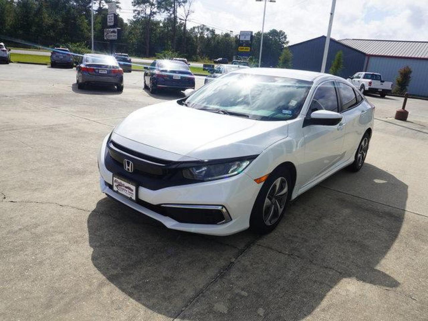 2020 White Honda Civic (19XFC2F67LE) with an 2.0L 4Cyl engine, Automatic CVT transmission, located at 6904 Johnston St., Lafayette, LA, 70503, (337) 988-1960, 30.143589, -92.100601 - Prices are subject to change as improvements done by the service dept. Prices are for Cash sales only, Plus TTL. This Vehicle is Serviced well and Warranties Available too. Easy Financing. Drives Great and everything works. Price subject to change as improvements done by the service dept. Easy CR - Photo#5