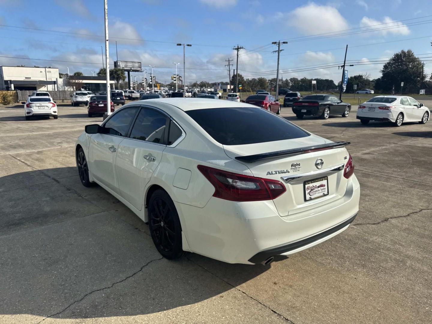 2017 Pearl White /Black Nissan Altima 2.5 SR Sedan (1N4AL3AP5HC) , Automatic transmission, located at 6904 Johnston St., Lafayette, LA, 70503, (337) 988-1960, 30.143589, -92.100601 - Photo#8