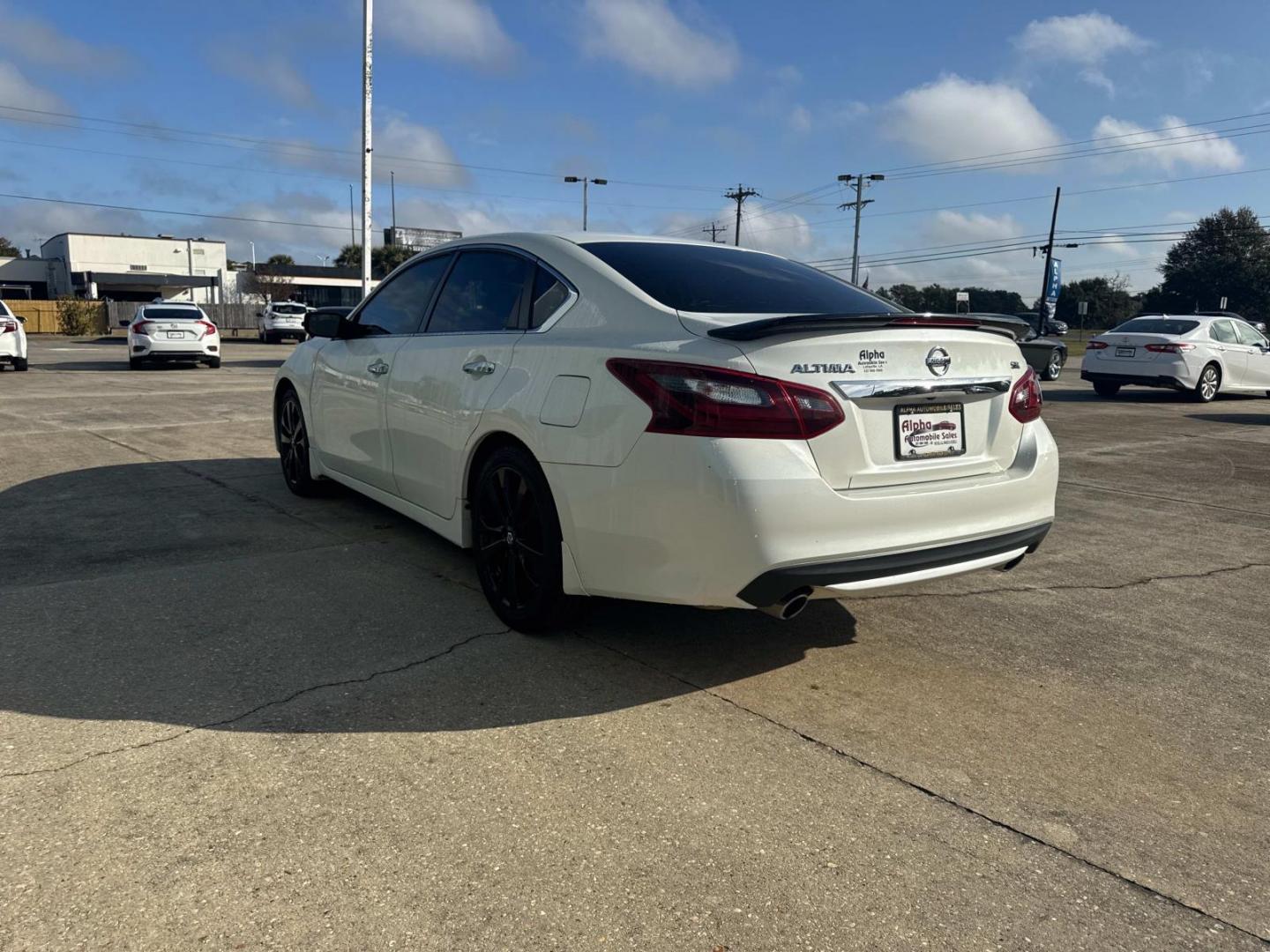 2017 Pearl White /Black Nissan Altima 2.5 SR Sedan (1N4AL3AP5HC) , Automatic transmission, located at 6904 Johnston St., Lafayette, LA, 70503, (337) 988-1960, 30.143589, -92.100601 - Photo#9