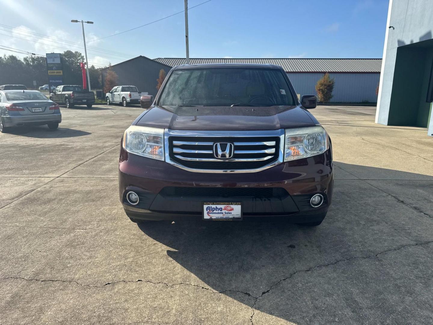 2013 Red /Beige Honda Pilot 2WD 4dr EX (5FNYF3H4XDB) , N/A transmission, located at 6904 Johnston St., Lafayette, LA, 70503, (337) 988-1960, 30.143589, -92.100601 - Photo#2