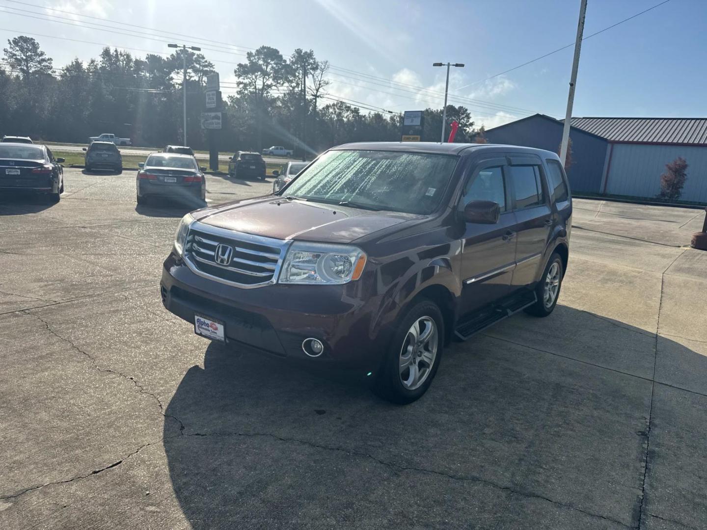 2013 Red /Beige Honda Pilot 2WD 4dr EX (5FNYF3H4XDB) , N/A transmission, located at 6904 Johnston St., Lafayette, LA, 70503, (337) 988-1960, 30.143589, -92.100601 - Photo#4