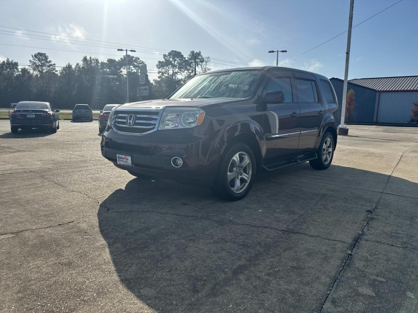 2013 Red /Beige Honda Pilot 2WD 4dr EX (5FNYF3H4XDB) , N/A transmission, located at 6904 Johnston St., Lafayette, LA, 70503, (337) 988-1960, 30.143589, -92.100601 - Photo#5