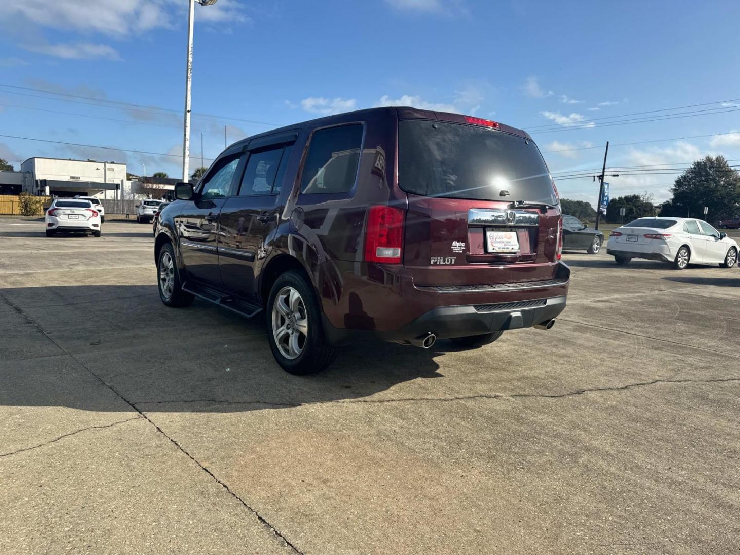 2013 Red /Beige Honda Pilot 2WD 4dr EX (5FNYF3H4XDB) , N/A transmission, located at 6904 Johnston St., Lafayette, LA, 70503, (337) 988-1960, 30.143589, -92.100601 - Photo#8