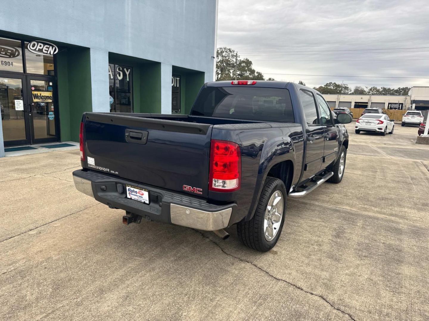 2012 Midnight Blue Metallic /Tan GMC Sierra 1500 2WD Crew Cab 143.5 SLE (3GTP1VE09CG) , N/A transmission, located at 6904 Johnston St., Lafayette, LA, 70503, (337) 988-1960, 30.143589, -92.100601 - Photo#11