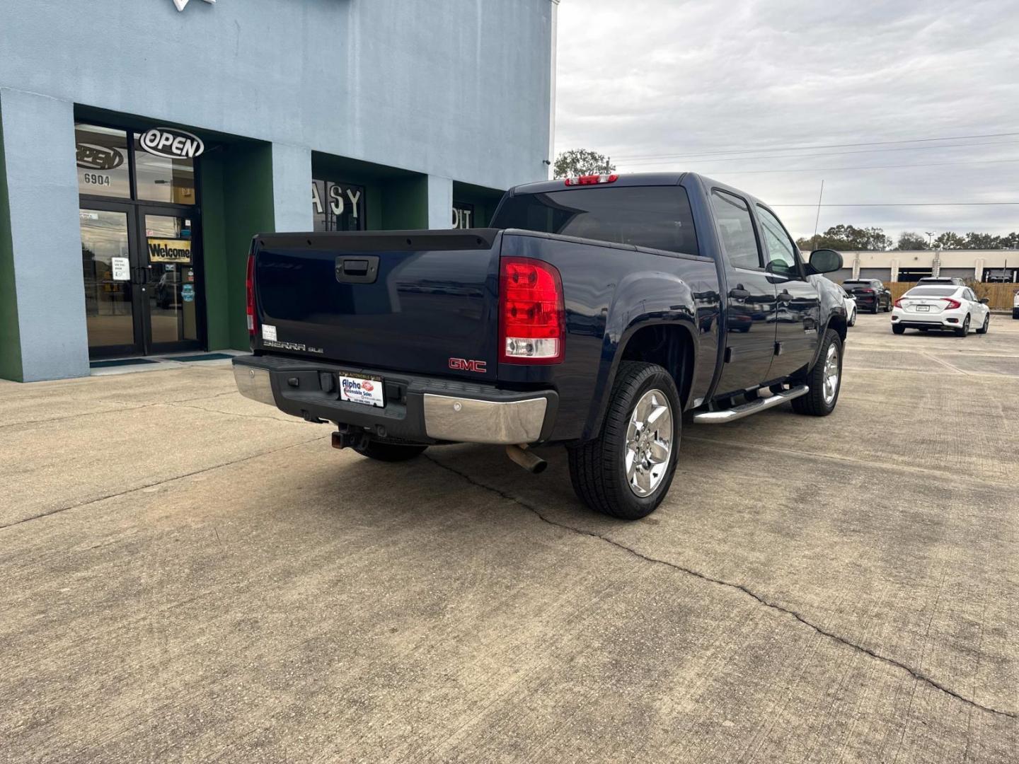 2012 Midnight Blue Metallic /Tan GMC Sierra 1500 2WD Crew Cab 143.5 SLE (3GTP1VE09CG) , N/A transmission, located at 6904 Johnston St., Lafayette, LA, 70503, (337) 988-1960, 30.143589, -92.100601 - Photo#12