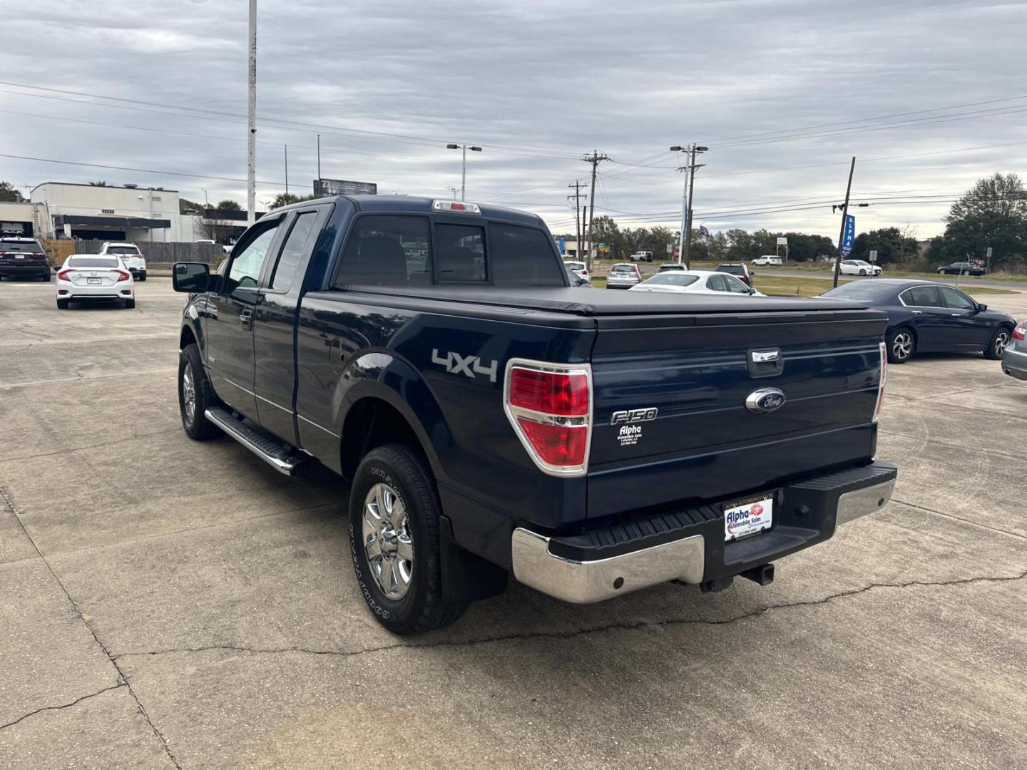 2013 Blue /Gray Ford F-150 4WD SuperCab 145 XL (1FTFX1ETXDF) , Automatic transmission, located at 6904 Johnston St., Lafayette, LA, 70503, (337) 988-1960, 30.143589, -92.100601 - Photo#7