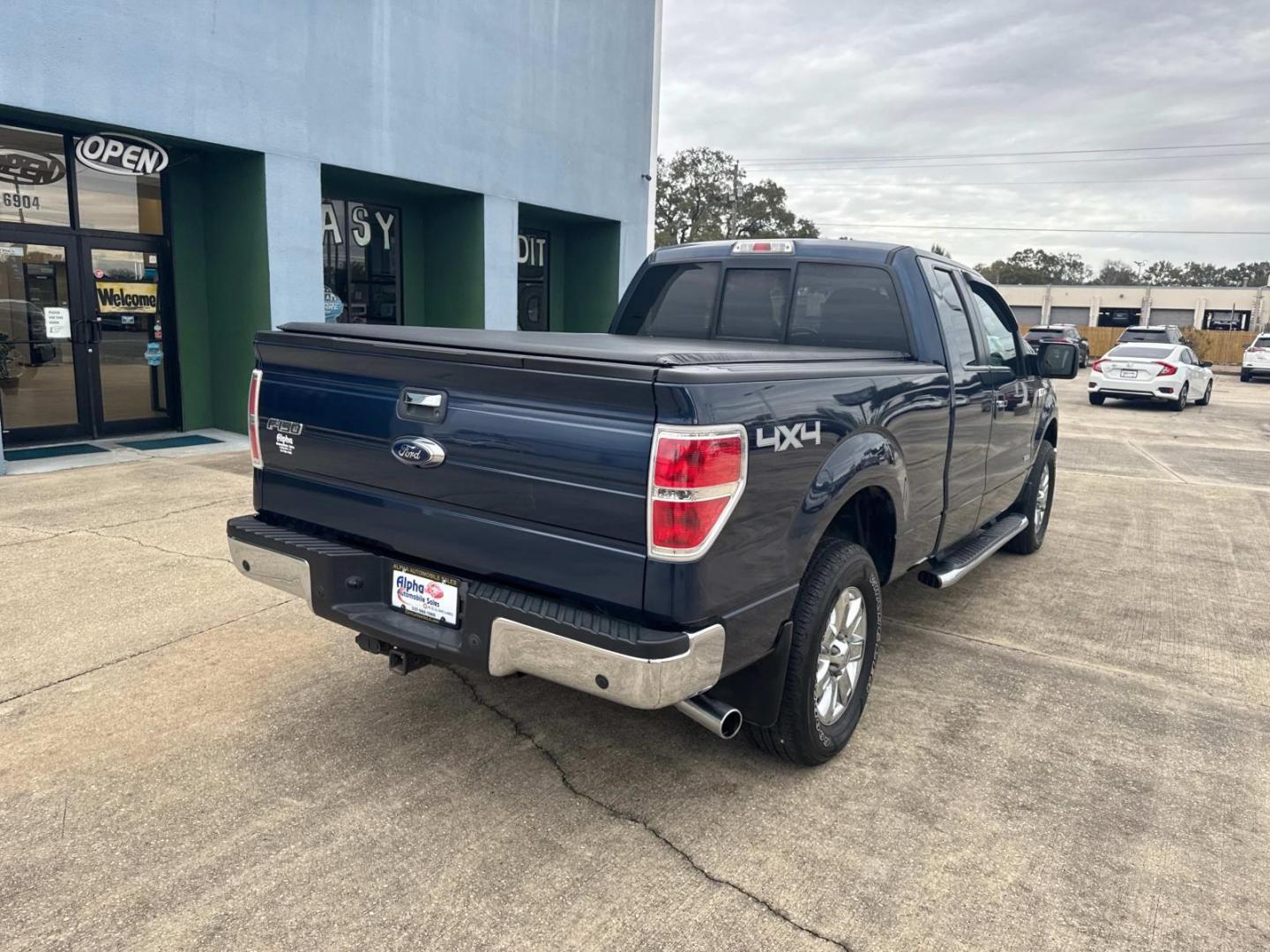 2013 Blue /Gray Ford F-150 4WD SuperCab 145 XL (1FTFX1ETXDF) , Automatic transmission, located at 6904 Johnston St., Lafayette, LA, 70503, (337) 988-1960, 30.143589, -92.100601 - Photo#11