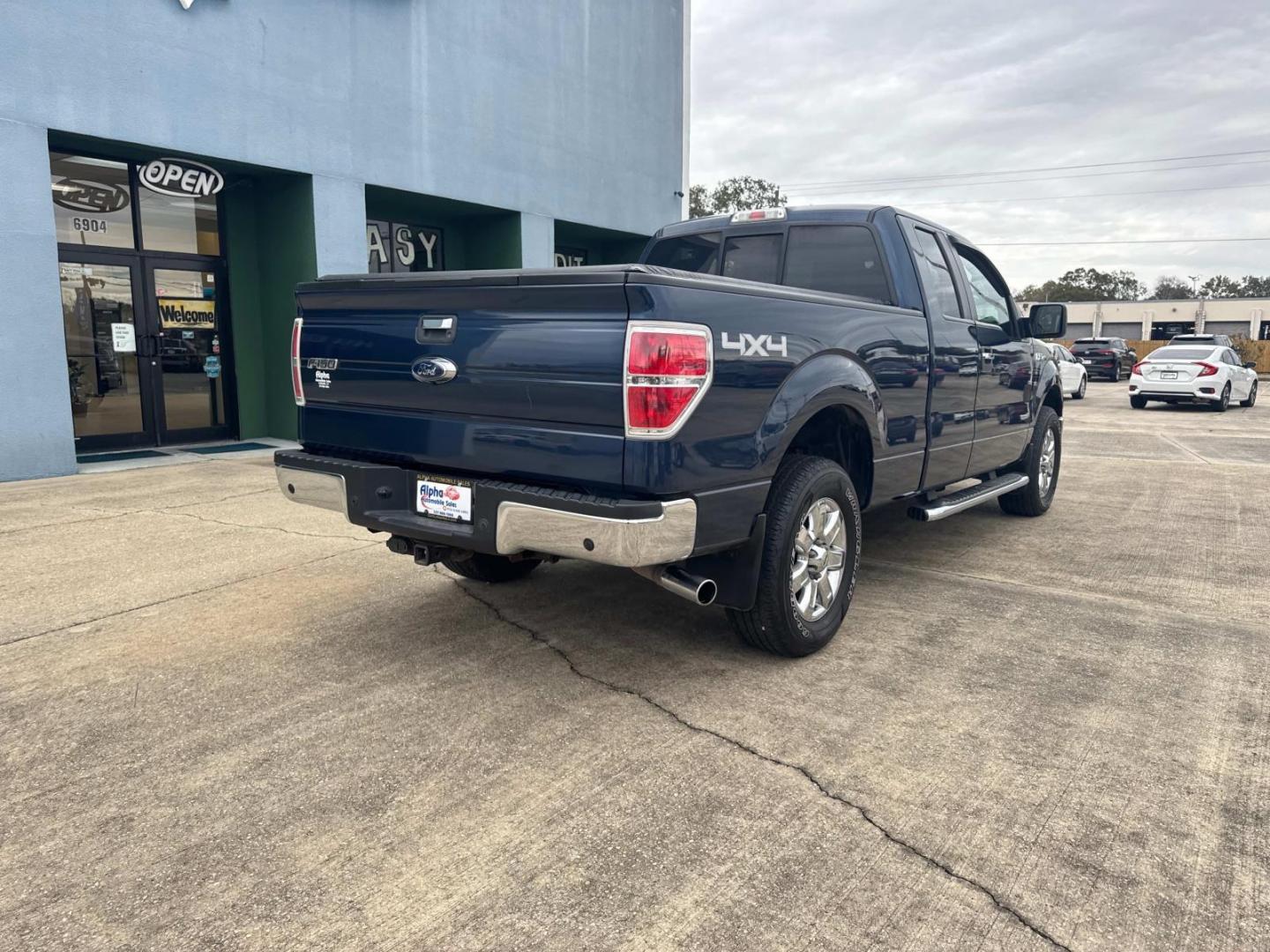 2013 Blue /Gray Ford F-150 4WD SuperCab 145 XL (1FTFX1ETXDF) , Automatic transmission, located at 6904 Johnston St., Lafayette, LA, 70503, (337) 988-1960, 30.143589, -92.100601 - Photo#12