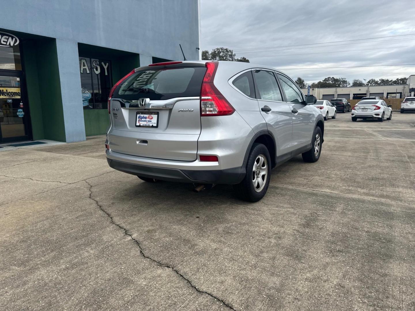 2016 Silver /Gray Honda CR-V AWD 5dr LX (5J6RM4H35GL) , Automatic transmission, located at 6904 Johnston St., Lafayette, LA, 70503, (337) 988-1960, 30.143589, -92.100601 - Photo#12