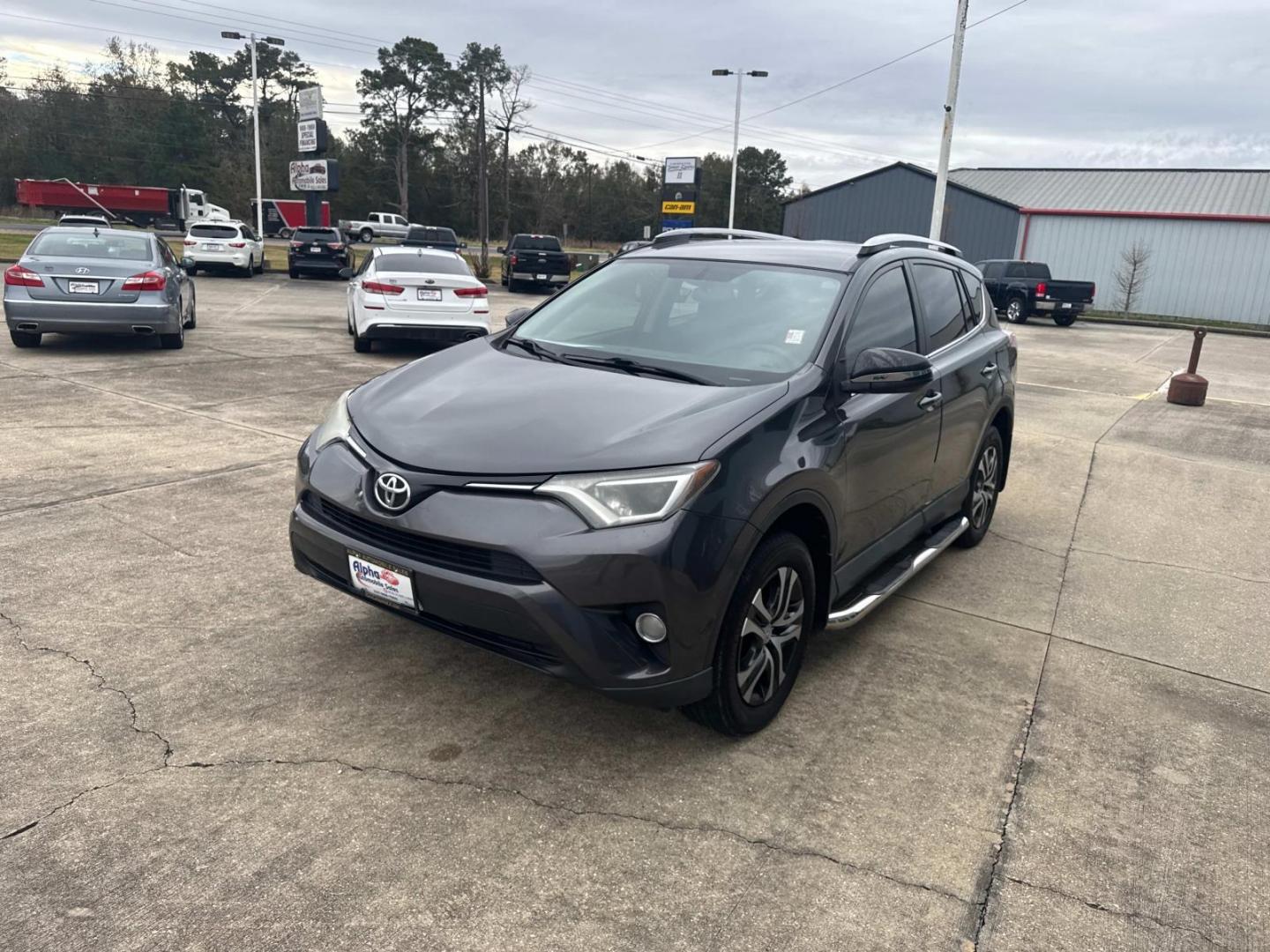 2016 Gray /Black Toyota RAV4 FWD 4dr LE (Natl) (2T3ZFREV8GW) , N/A transmission, located at 6904 Johnston St., Lafayette, LA, 70503, (337) 988-1960, 30.143589, -92.100601 - Photo#4