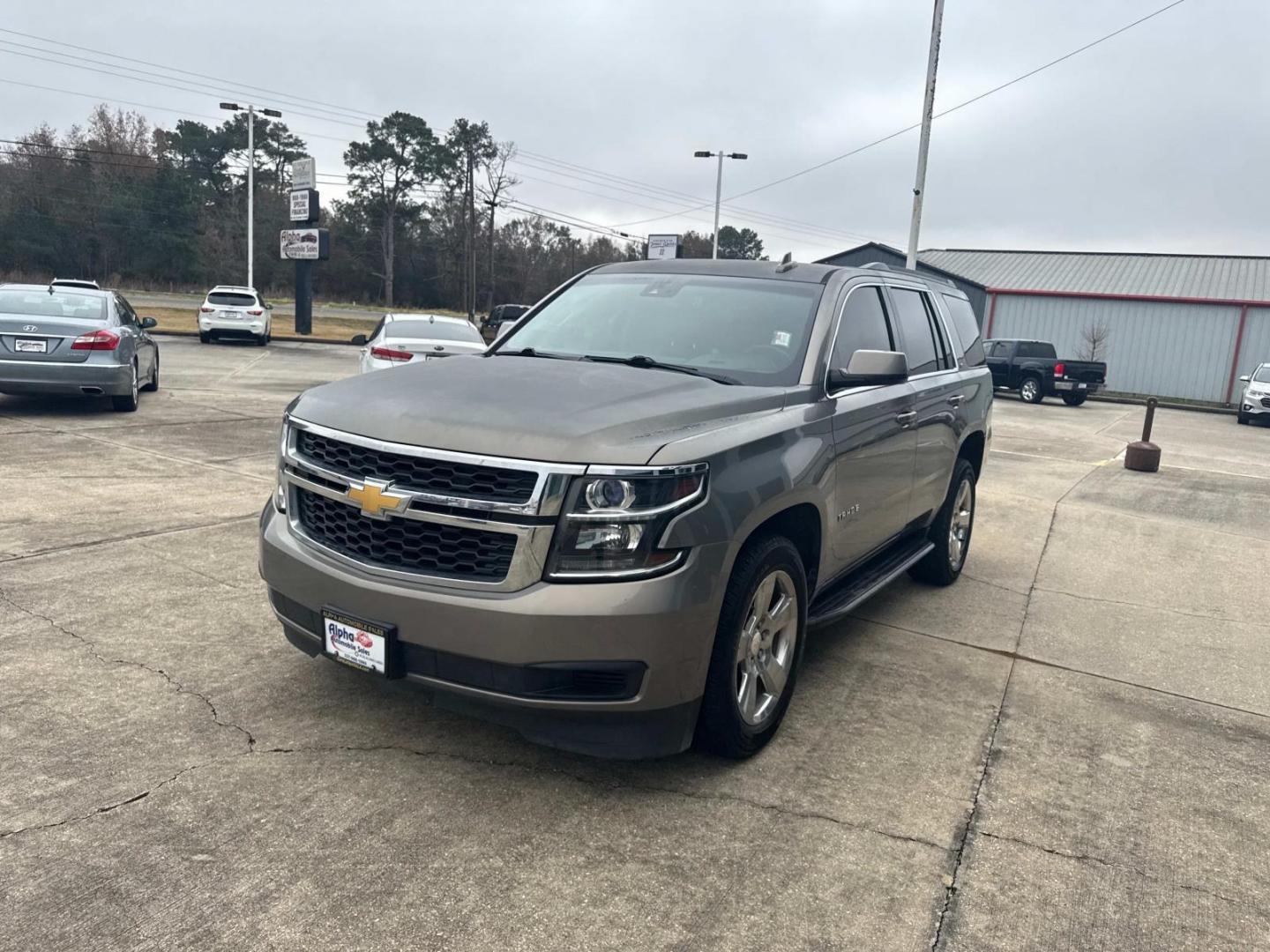 2017 Champagne Silver Metallic /Jet Black Chevrolet Tahoe 2WD 4dr LT (1GNSCBKCXHR) , N/A transmission, located at 6904 Johnston St., Lafayette, LA, 70503, (337) 988-1960, 30.143589, -92.100601 - Photo#4