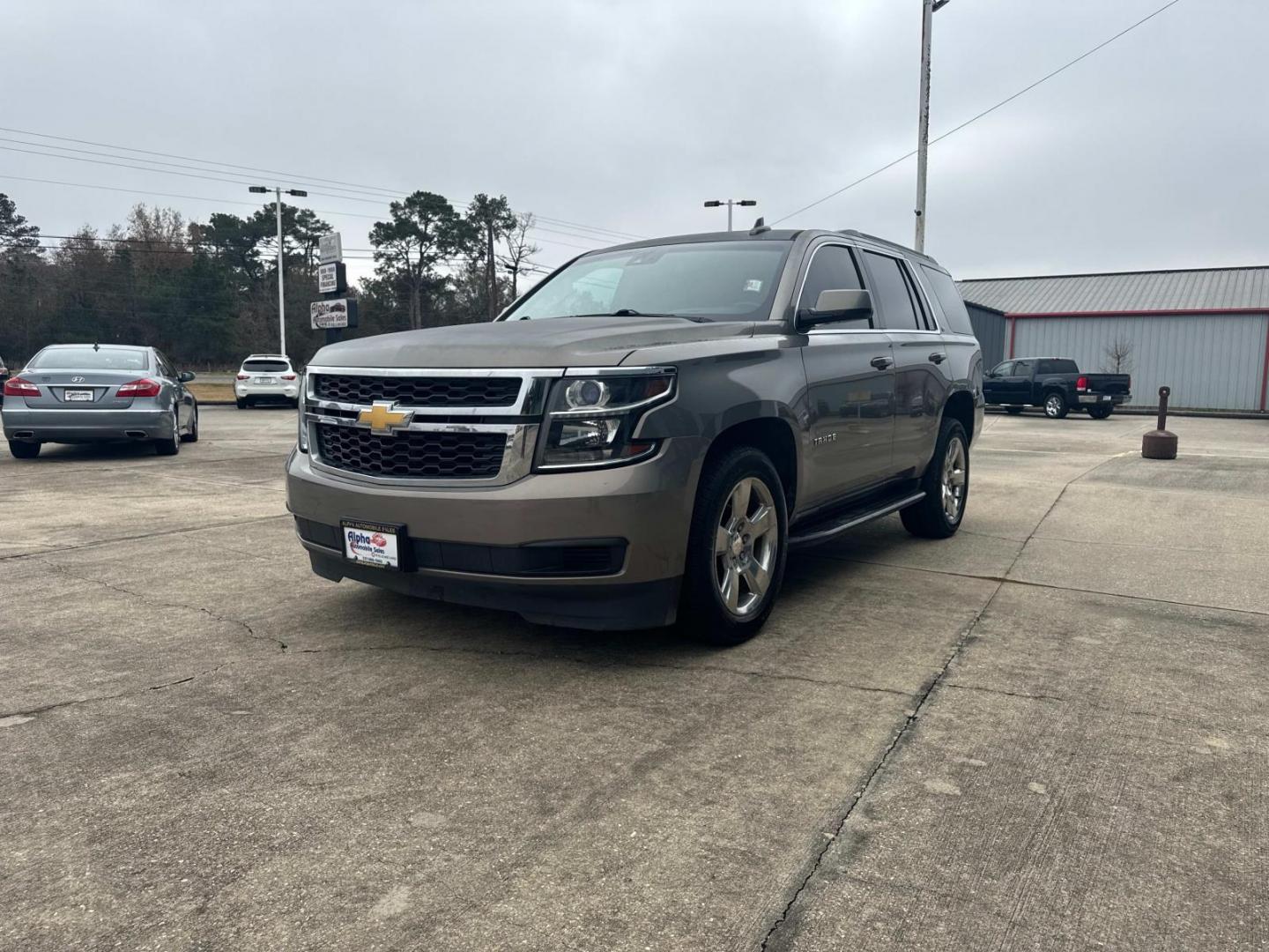 2017 Champagne Silver Metallic /Jet Black Chevrolet Tahoe 2WD 4dr LT (1GNSCBKCXHR) , N/A transmission, located at 6904 Johnston St., Lafayette, LA, 70503, (337) 988-1960, 30.143589, -92.100601 - Photo#5