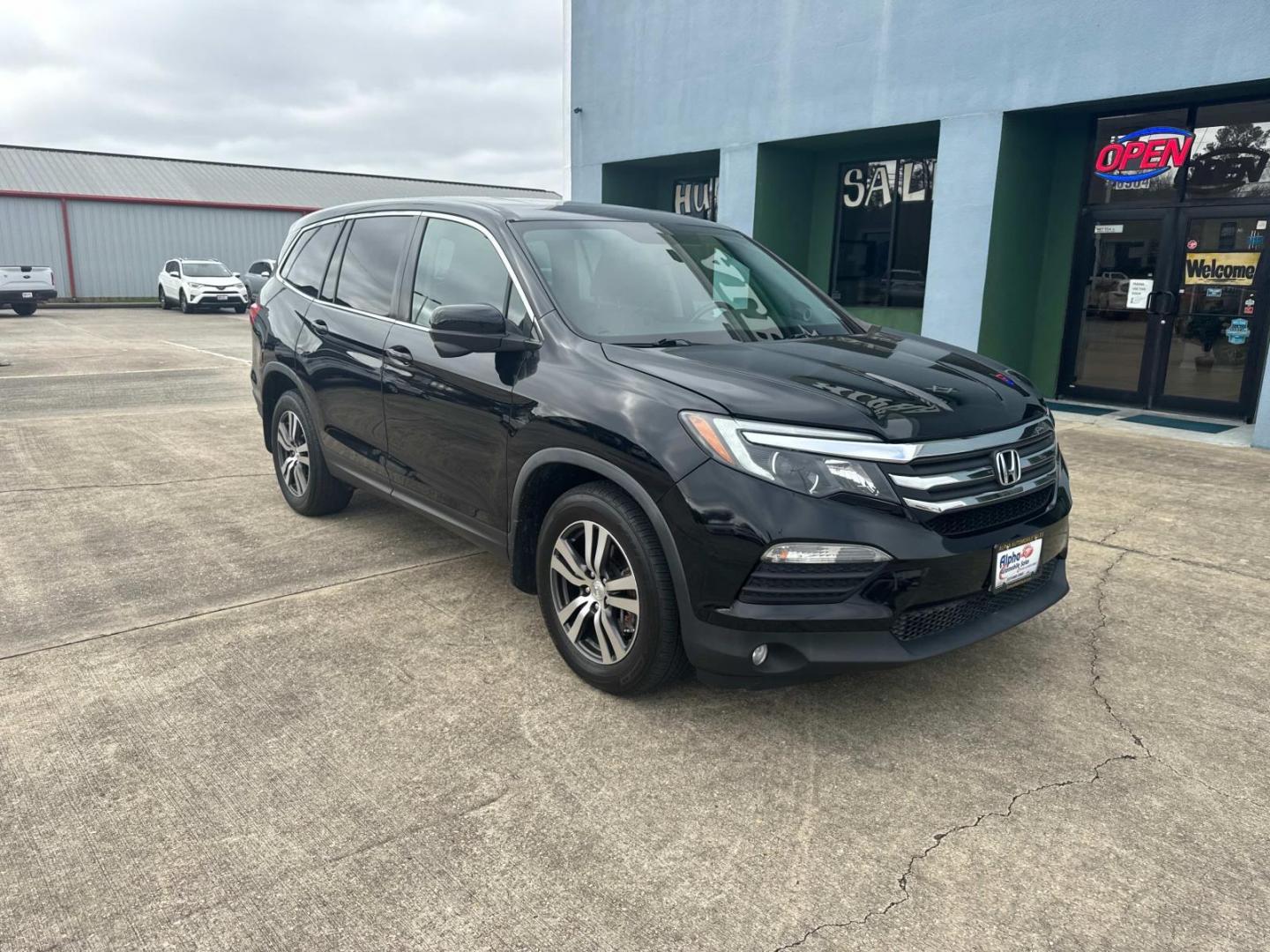 2017 Black Forest Pearl /Black Honda Pilot EX-L 2WD (5FNYF5H56HB) , Automatic transmission, located at 6904 Johnston St., Lafayette, LA, 70503, (337) 988-1960, 30.143589, -92.100601 - Photo#1