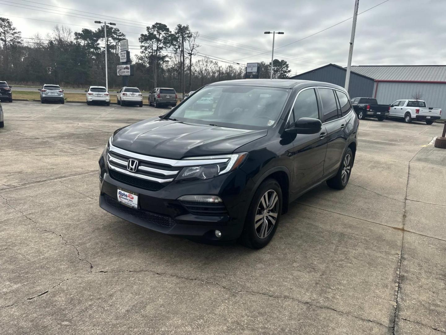 2017 Black Forest Pearl /Black Honda Pilot EX-L 2WD (5FNYF5H56HB) , Automatic transmission, located at 6904 Johnston St., Lafayette, LA, 70503, (337) 988-1960, 30.143589, -92.100601 - Photo#4