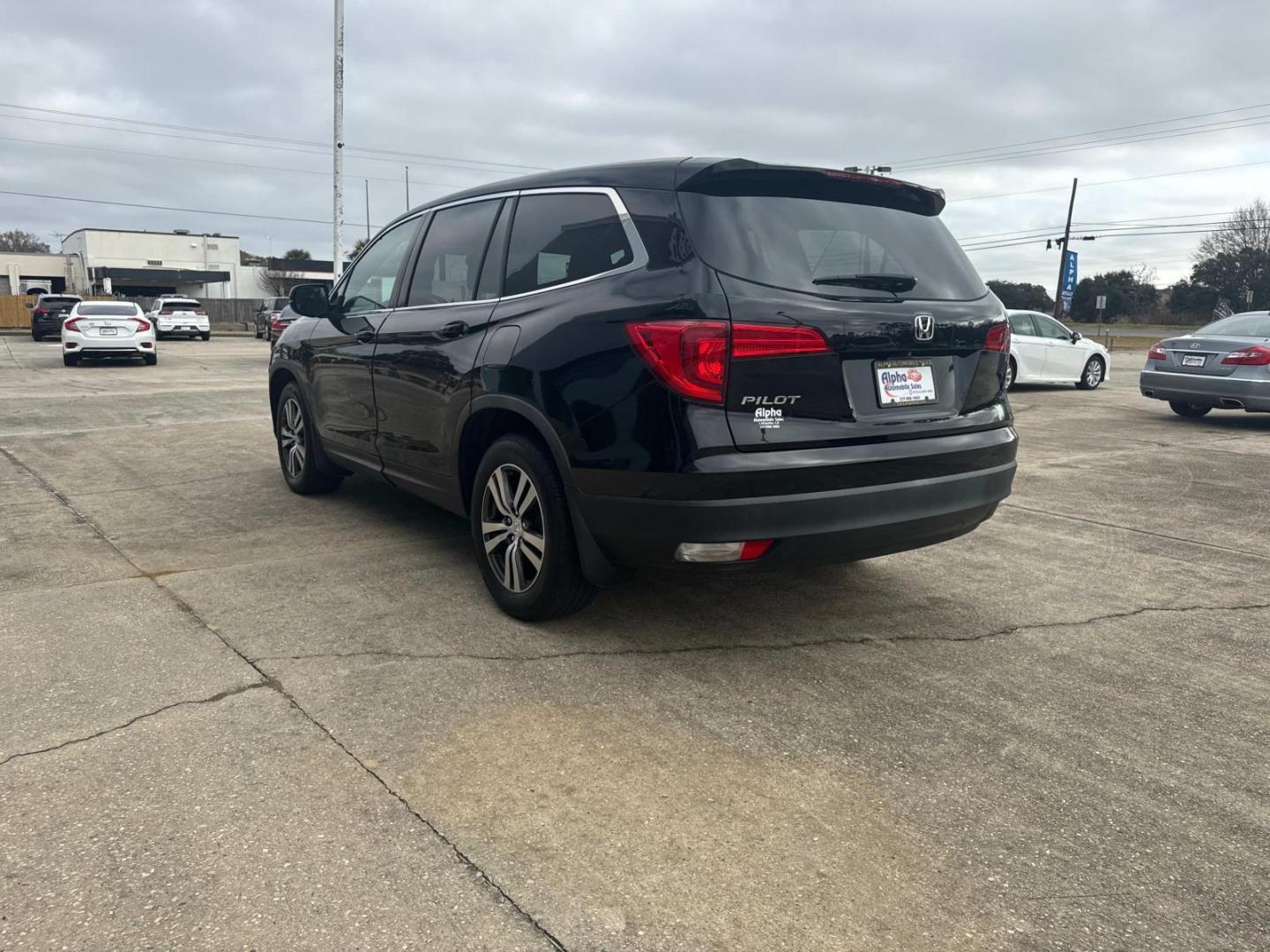 2017 Black Forest Pearl /Black Honda Pilot EX-L 2WD (5FNYF5H56HB) , Automatic transmission, located at 6904 Johnston St., Lafayette, LA, 70503, (337) 988-1960, 30.143589, -92.100601 - Photo#8