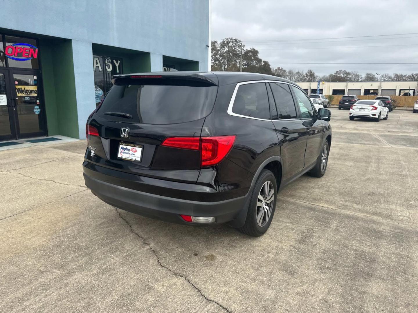 2017 Black Forest Pearl /Black Honda Pilot EX-L 2WD (5FNYF5H56HB) , Automatic transmission, located at 6904 Johnston St., Lafayette, LA, 70503, (337) 988-1960, 30.143589, -92.100601 - Photo#11