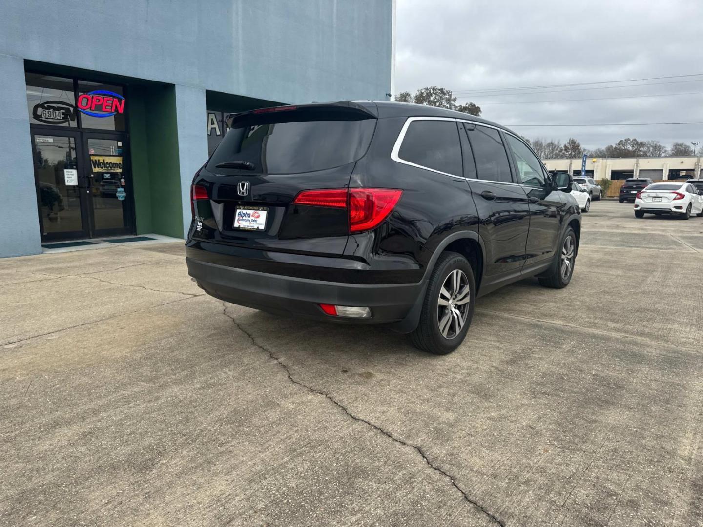 2017 Black Forest Pearl /Black Honda Pilot EX-L 2WD (5FNYF5H56HB) , Automatic transmission, located at 6904 Johnston St., Lafayette, LA, 70503, (337) 988-1960, 30.143589, -92.100601 - Photo#12