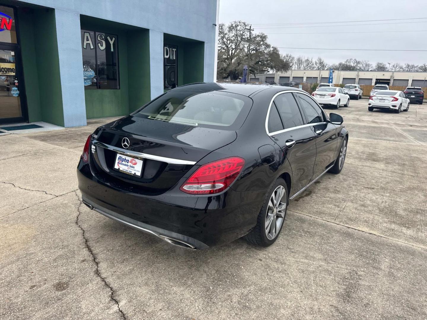 2016 Black /Silk Beige Mercedes-Benz C-Class C300 Sedan (55SWF4JB4GU) , Automatic transmission, located at 6904 Johnston St., Lafayette, LA, 70503, (337) 988-1960, 30.143589, -92.100601 - Photo#12