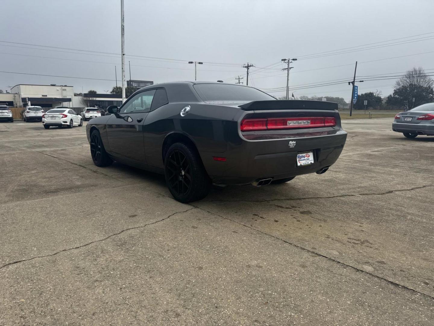 2014 Granite Crystal Metallic Clearcoat /Black Dodge Challenger 2dr Cpe SXT (2C3CDYAG0EH) , N/A transmission, located at 6904 Johnston St., Lafayette, LA, 70503, (337) 988-1960, 30.143589, -92.100601 - Photo#9