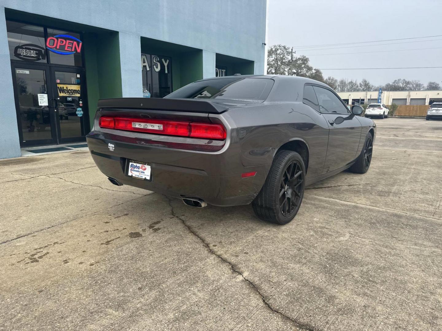 2014 Granite Crystal Metallic Clearcoat /Black Dodge Challenger 2dr Cpe SXT (2C3CDYAG0EH) , N/A transmission, located at 6904 Johnston St., Lafayette, LA, 70503, (337) 988-1960, 30.143589, -92.100601 - Photo#13