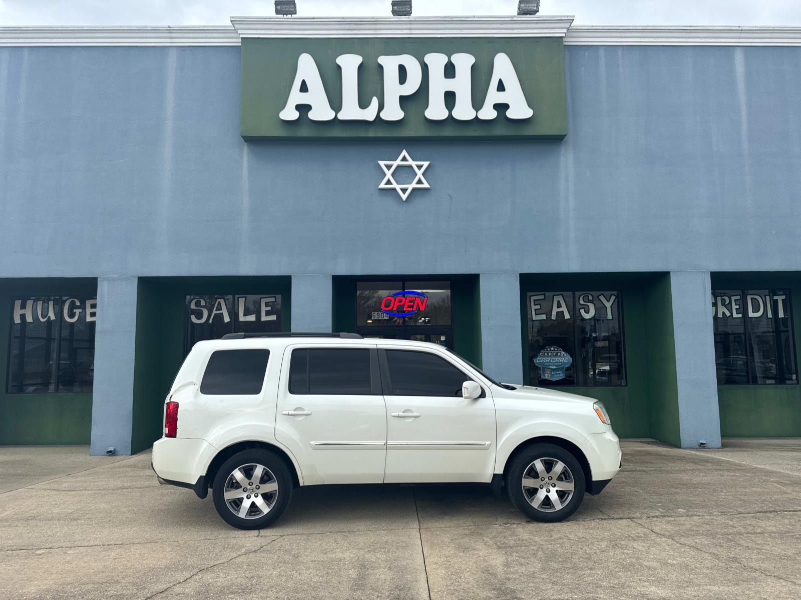 photo of 2014 Honda Pilot 2WD 4dr Touring w/RES  and  Navi